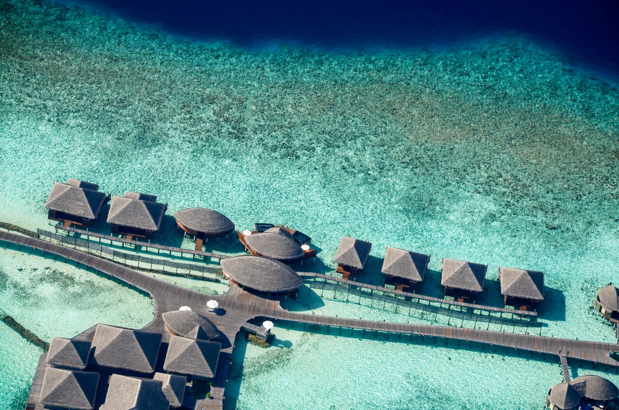 Bird's eye view of accommodation over the water in Maldives