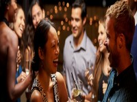 Couples Dancing And Drinking At Evening Party banner iStock 505964108
