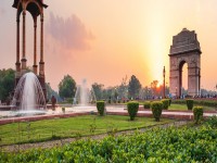 The Canopy and the India Gate at sunset in New Delhi view from the National War Memorial banner iStock 1299473217