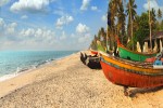 old fishing boats on beach kerala india iStock 1404349213