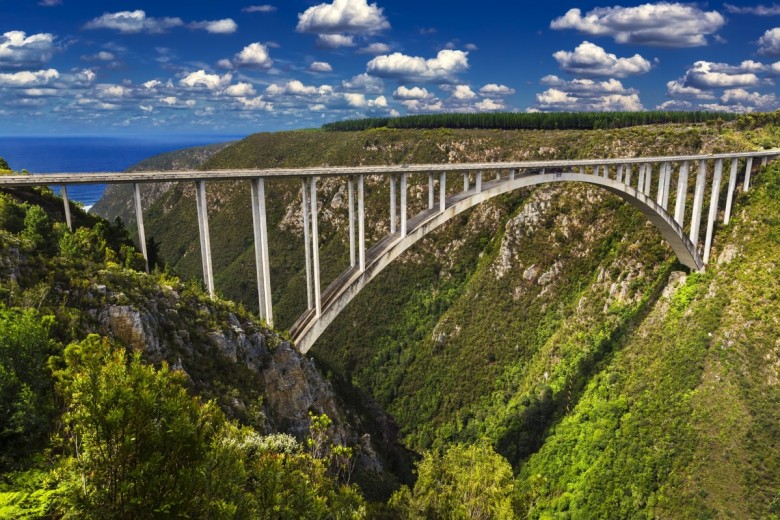 Western Cape Province Tsitsikamma region of the Garden Route. The Bloukrans Bridge seen from the north worlds highest bungy bridge 216 m heigh above the Bloukrans River shutterstock 458156305