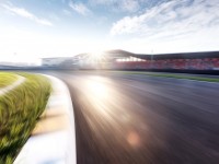 blurry view of empty asphalt road in zhejiang shaoxing circuit in sunny sky iStock 882063088 1